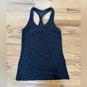 Lululemon top. Black/gray leopard pattern. Size 8